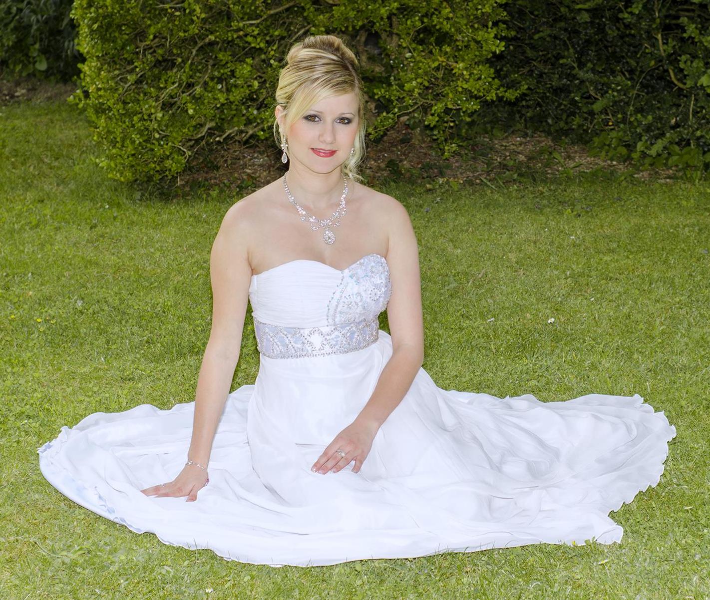 Blonde Young Bride wearing White Long Silk Dress